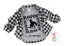 Load image into Gallery viewer, Ropin&#39; Ridin&#39; Buckin&#39; Slidin&#39; Kids Shirt